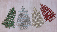 Laser engraved family names on wood ornament