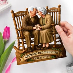 3D effect old couple wooden plaque closeup