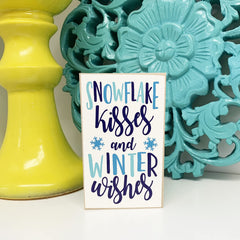 3in x 5in white wood sign featuring Snowflake kisses and Winter wishes