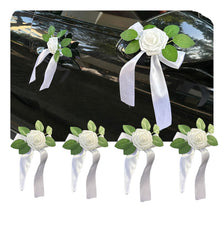 Four artificial silk flowers with white satin bows for car door handles