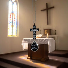 Handcrafted dark wood pendant with engraved symbols