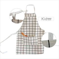 kid-size apron from Lovely Cotton Parent Child Apron in white