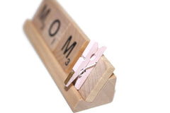 Wood clothespin accessory included with Hiding Place Boutique Love Frame