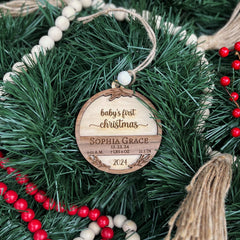 3-inch diameter wooden ornament with floral engraving