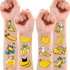 Hands applying a banana temporary tattoo with water