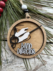 Two-layer hand-painted wood ornament made in North Carolina by a family team