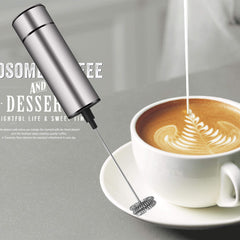 Close up of double steel whisk inside frother