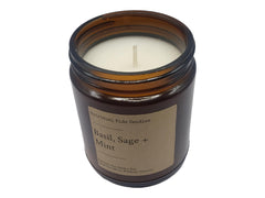 Aromatic Basil Sage Mint candle in glass jar ready for display