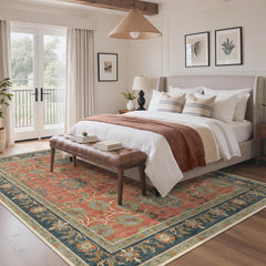 Close up of dusty blue and sage green tones on Bavni rug