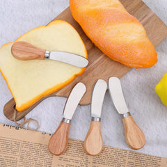 Pack of four cheese spreaders for butter jam and cheese in kitchen setting