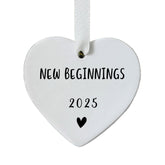 Beginnings 2025 Ornament heart shaped ceramic with white ribbon