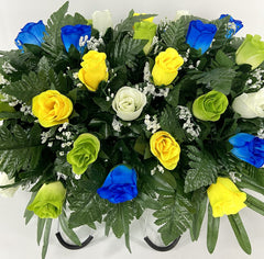 Sympathy memorial arrangement blue green yellow roses baby's breath
