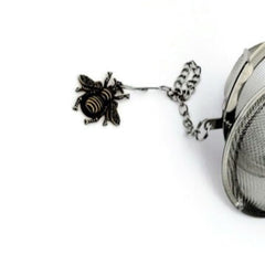 Bronze Bee charm on stainless steel tea infuser ball