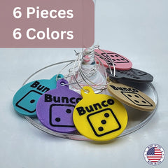 Six bunco dice wine glass charms with assorted colors and metal rings