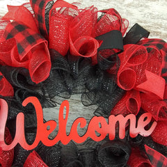 Burlap accented wreath in red and black plaid