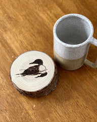 Unfinished wood surface coaster protects furniture from heat and moisture