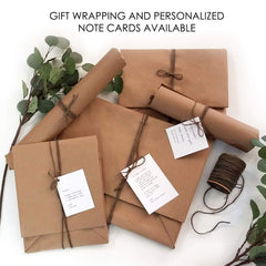 Gift-ready Canary Road Long Distance Kitchen Towel wrapped in cellophane sleeve 16x24