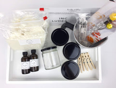 Candlemaking kit contents showing 9 oz jars and lids