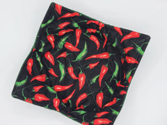 Close up of cayenne pepper print on one side