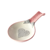 Ceramic spoon rest stove top pink white