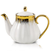 Ceramic Teapot white with gold trim on display