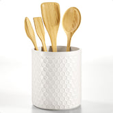 Ceramic utensil holder on kitchen counter with anti-slip base