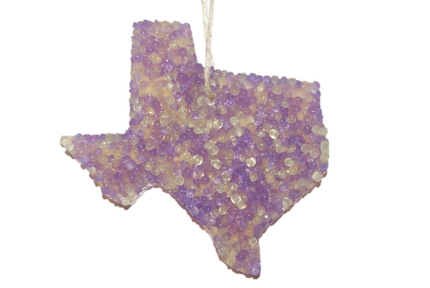 ChicWick Lemon Lavender Texas Shape Car Freshener hanging from car rearview mirror