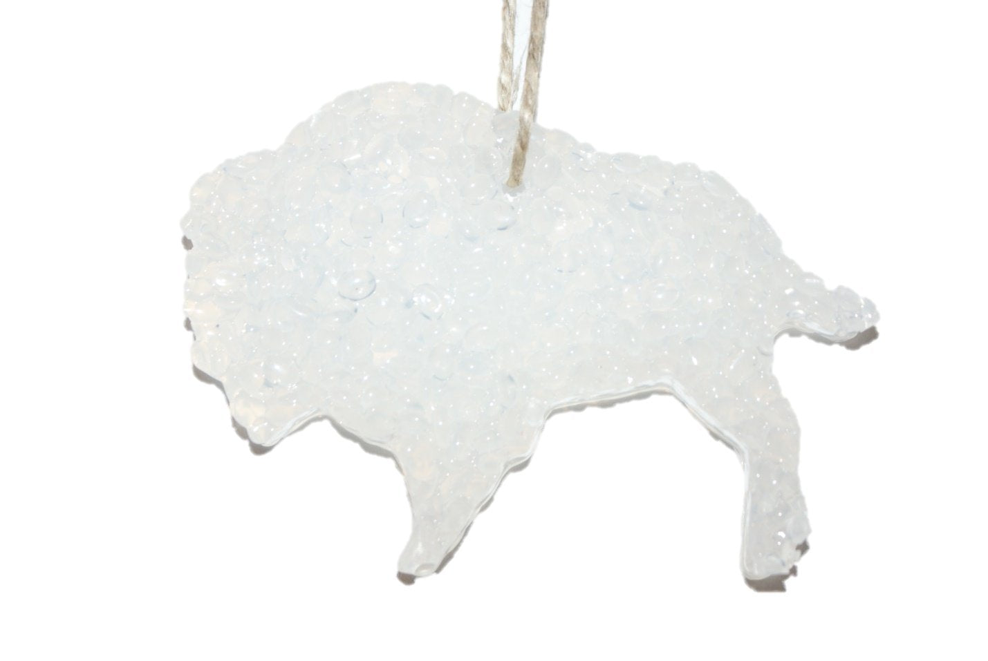 ChicWick Nag Champa Buffalo Shape Car Freshener hanging from car mirror