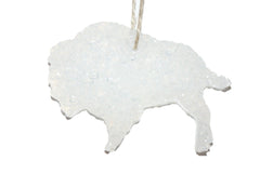 ChicWick Nag Champa Buffalo Shape Car Freshener hanging from car mirror