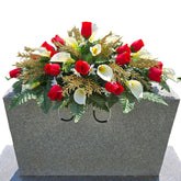 Christmas Cemetery Saddle with red rosebuds and cream calla lilies