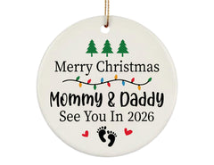 Two-sided ceramic ornament for pregnancy announcement on Christmas tree