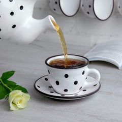 White and black polka dot teacup City to Cottage