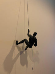 Unique climbing man wall art design