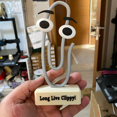 Clippy 3D printed figurine on office desk