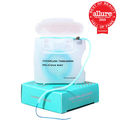 Mint scented CocoPlush floss threaders on spool with 30 pre-measured strands