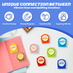 Color coded motivational clips on metal surface