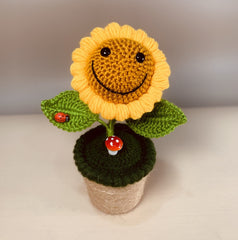 Handmade crochet sunflower ornament made with cotton and acrylic blend yarn