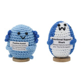 crochet shark plush with wooden base