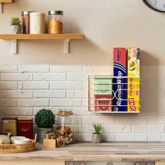 Wrap organizer mounted on kitchen wall for bigger rolls