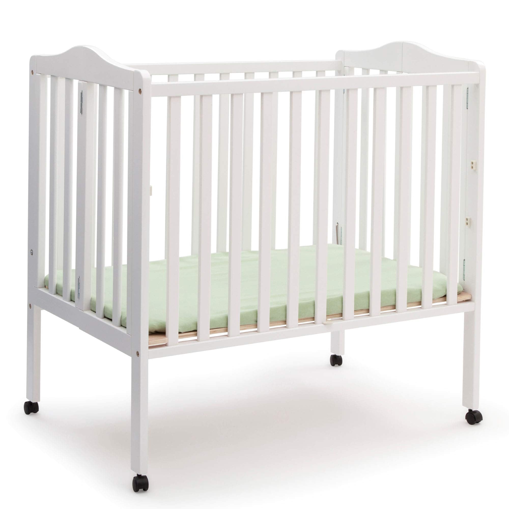 Delta Children folding portable mini baby crib white