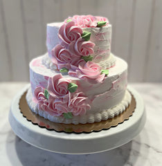 Fake wedding cake by Dezicakes on display