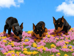 Pet-inspired color accented Doberman figurines from multiple angles