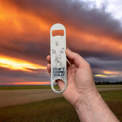 Slim compact durable bottle opener in stainless steel