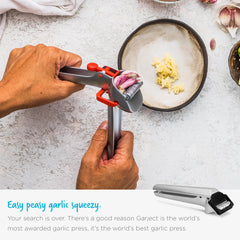 Dreamfarm Garject garlic press and mincer with peel ejector