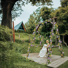 Faux hanging vine daisy garland for baby shower backdrop