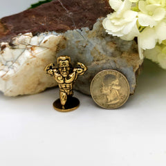 Compact weightlifter sculpture size 2.7 cm by 1.7 cm by 3.5 cm