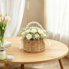 Beige satin bowknot on flower girl basket