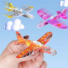 Children playing with foam airplanes outdoors