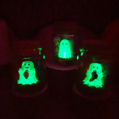 Glow in the dark ghost in a jar figure