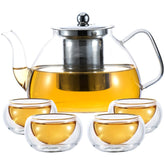 Glass teapot with four double-walled teacups